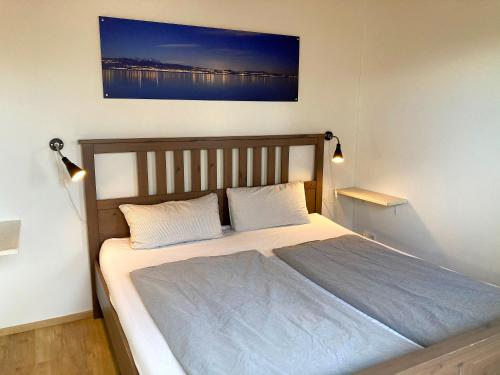 Postelja oz. postelje v sobi nastanitve Zum Seglerhafen – Ferienappartement