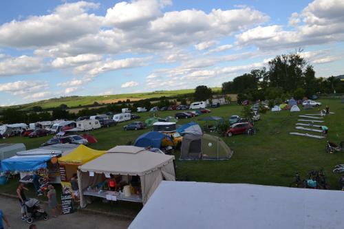 an aerial view of a park with tents and cars at Penzion Sedlecká vína in Sedlec
