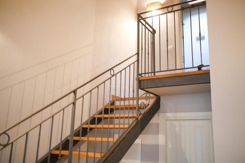 a staircase in a building with a stair case at Casanova in Scandicci