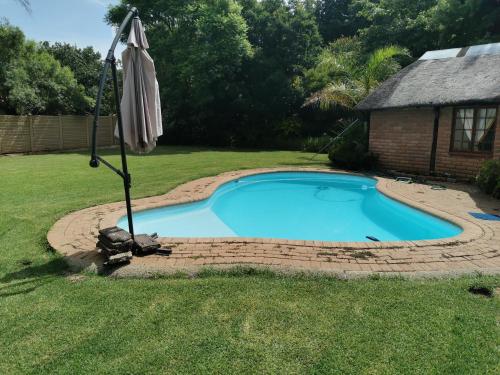 Πισίνα στο ή κοντά στο Gluckman Drive Guesthouse