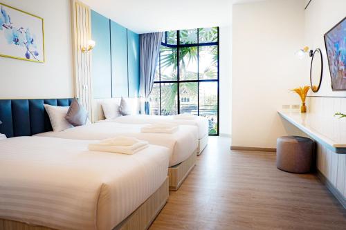 Letto o letti in una camera di Poolrada Boutique Hotel - SHA Plus