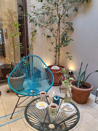 Posezení v ubytování L'Adresse Hôtel Boutique