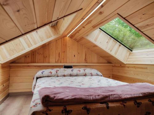 מיטה או מיטות בחדר ב-Camping Prades Park
