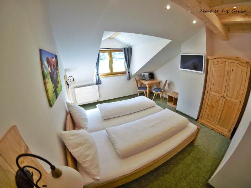 Postel nebo postele na pokoji v ubytování Gästehaus Siegllehen