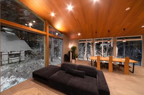 Posezení v ubytování Hakuba Jade Chalet by Jade Group