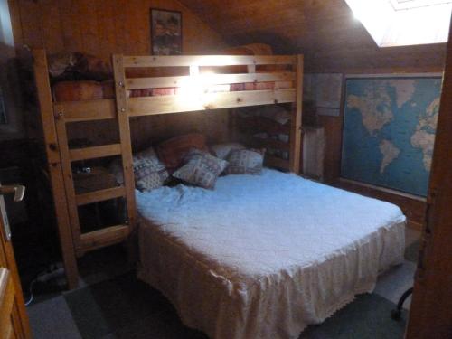 a bedroom with two bunk beds in a room at Greselin in Chorges