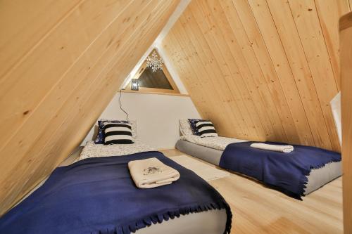 Cama o camas de una habitación en Dom na Wichrowym Wzgórzu