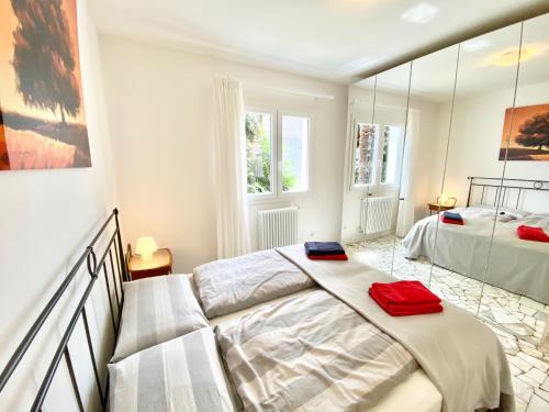 Ένα ή περισσότερα κρεβάτια σε δωμάτιο στο Appartamento Buresso