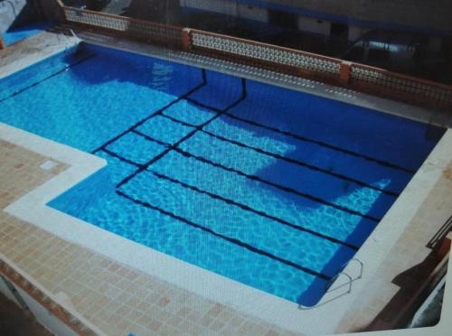 Bazén v ubytování Estudio Apartamento cerca de la playa nebo v jeho okolí