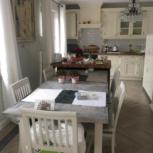 Fotografie z fotogalerie ubytování Mazurska Villa Deluxe w Pasymiu z prywatnym pomostem na jezioro Kalwa i łodzią na wyłączność Najwyższe Premium w Osada Zamkowa v destinaci Pasym