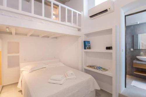 Postel nebo postele na pokoji v ubytování Casa Fiona, Little Venice, Mykonos