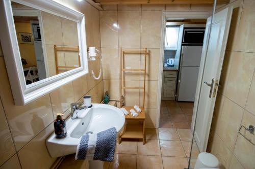 Vonios kambarys apgyvendinimo įstaigoje Yiasemi Cοrfu Luxury Apartment