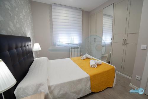 Postel nebo postele na pokoji v ubytování Apart A 5 min de Laurel coqueto y en pleno centro Vivienda de uso Turistico