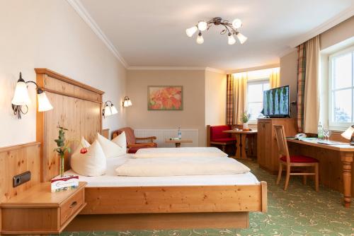 Postel nebo postele na pokoji v ubytování Hotel zur Post
