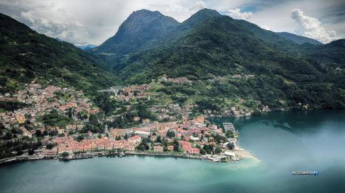 an aerial view of a town in the middle of a lake at The Cozy Nest - Bellano in Bellano