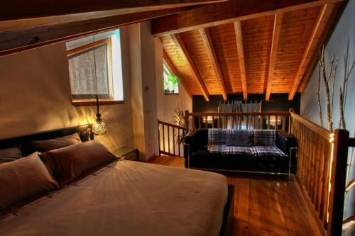 Postel nebo postele na pokoji v ubytování The Cozy Nest - Bellano