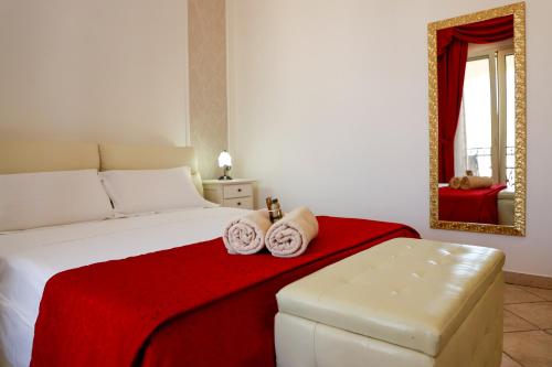 Postel nebo postele na pokoji v ubytování Il Baiocco affittacamere piscina & SPA
