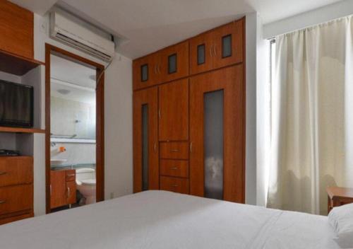 Cama o camas de una habitación en Apartamento familiar en Medellin Colombia