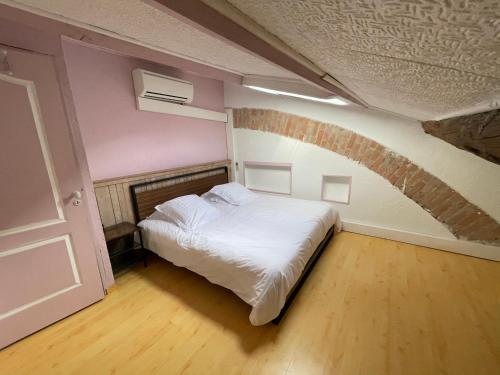 Postel nebo postele na pokoji v ubytování Gîte cévenol avec SPA et Piscine privatifs