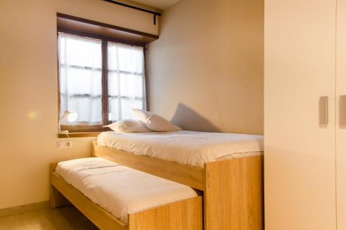 Ein Bett oder Betten in einem Zimmer der Unterkunft Apartamento Refugi d'Incles 6 personas