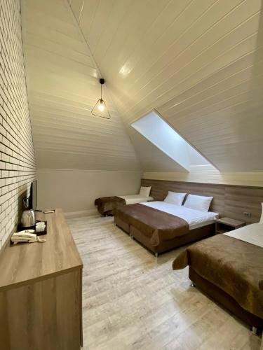 Säng eller sängar i ett rum på Max Spa Hotel
