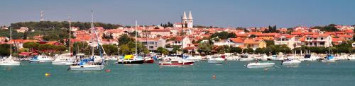 a bunch of boats in the water in a harbor at Bed & breakfast La Fontana Medulin in Medulin