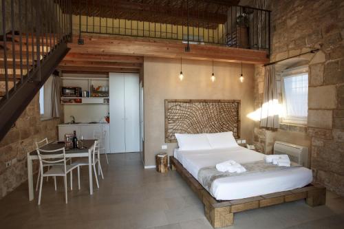 Voodi või voodid majutusasutuse Stacci Rural Resort toas