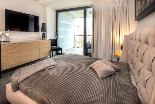 Posteľ alebo postele v izbe v ubytovaní Apartament SEASIDE parking w cenie