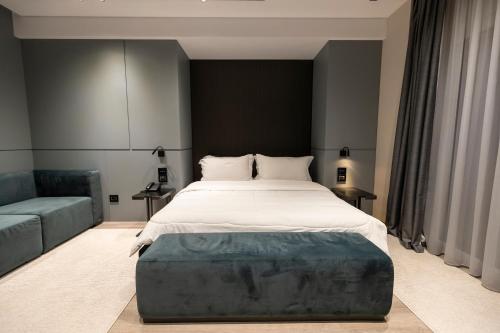 Postel nebo postele na pokoji v ubytování Demi Hotel