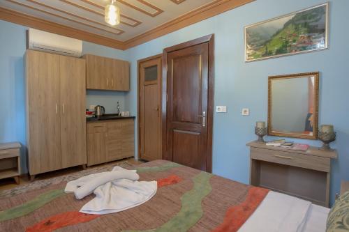 Postel nebo postele na pokoji v ubytování April Hotel