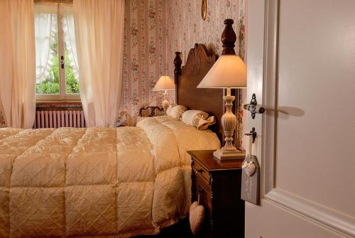 מיטה או מיטות בחדר ב-Villa La Paleotta