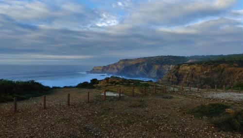 a view of the ocean and a rocky coast at Apartamentos na Quinta Altavista do Carvalhal in Zambujeira do Mar