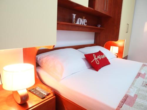 Voodi või voodid majutusasutuse Apartman Marija toas