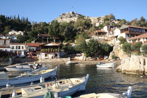 a group of boats docked in a body of water at Sea view Bougainvillea 52 in Kalkan