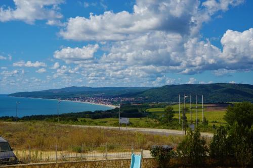 a view of a road and a body of water at Apartments Paskalina in Byala