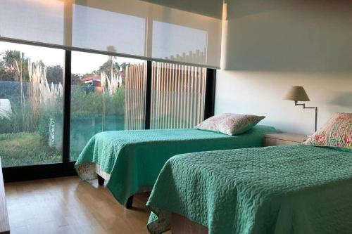Postel nebo postele na pokoji v ubytování Apartamento primera linea al mar, excelente punto
