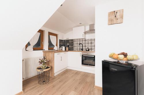 Η κουζίνα ή μικρή κουζίνα στο Black Forest Dream Apartments