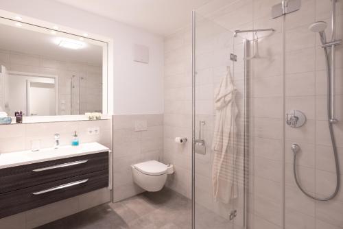 Ett badrum på Appartement "AUSZEIT" mit Penthouseflair - Oase am Haff