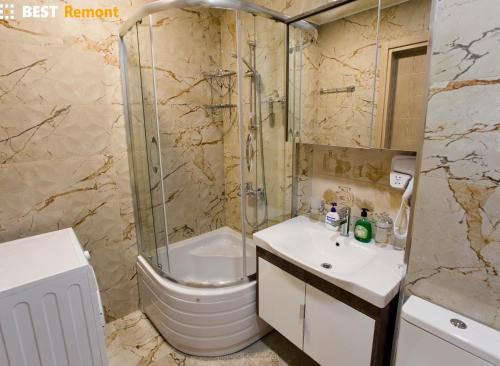 Ванная комната в Апартаменты Елена
