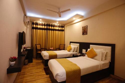 Letto o letti in una camera di Paradise Ganga - A River Side Hotel
