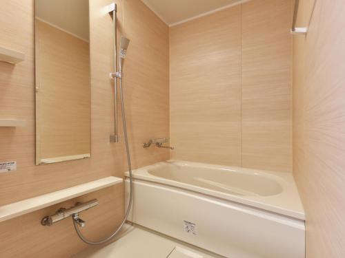 Kylpyhuone majoituspaikassa Hotel Shikanoyu