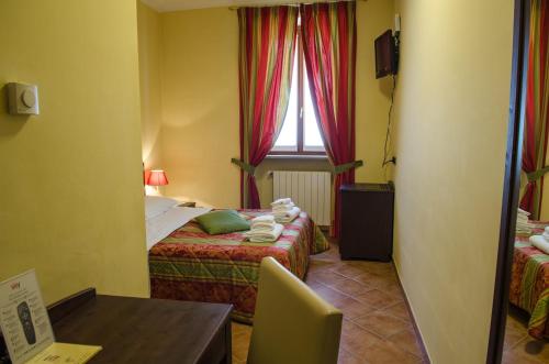Ένα ή περισσότερα κρεβάτια σε δωμάτιο στο Hotel Oberje Dla Viere