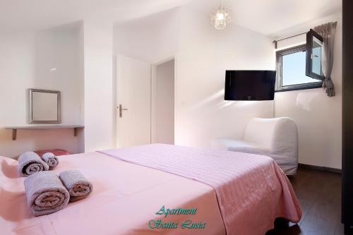 Posteľ alebo postele v izbe v ubytovaní Apartment "Santa Lucia"