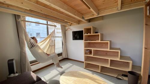 Μια τηλεόραση ή/και κέντρο ψυχαγωγίας στο Beach side House SHELL kamakurahase