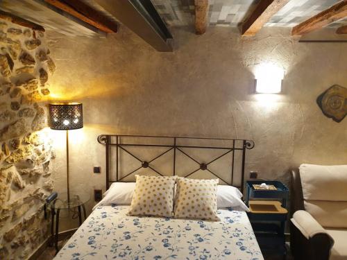 Postel nebo postele na pokoji v ubytování Hotel La Beltraneja