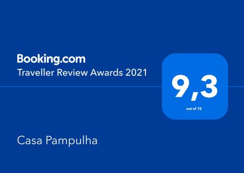 a screenshot of a cell phone with the text travel review awards at Casa Pampulha in Belo Horizonte