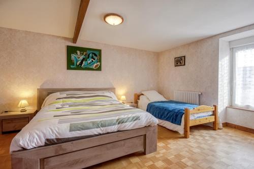 Ein Bett oder Betten in einem Zimmer der Unterkunft La Grenouillère - Grande longère bretonne - Pléneuf-Val-André