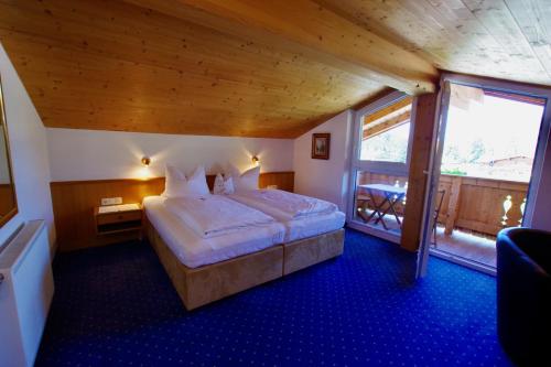 Postel nebo postele na pokoji v ubytování Hotel-Pension Heike