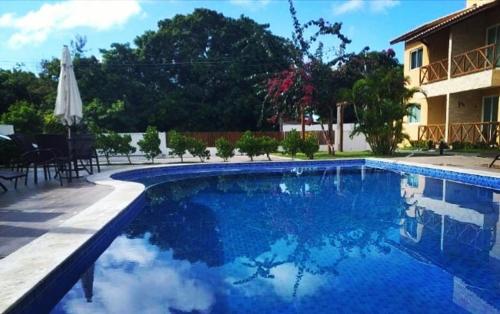 Swimming pool sa o malapit sa Guarajuba! Excelente localização, Lindo, confortável e decorado!