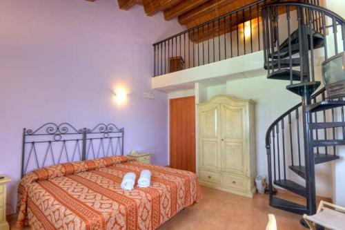 Tempat tidur dalam kamar di Hotel Ristorante Mira Conero